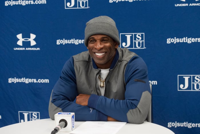 Deion Sanders answers questions at a SWAC press conference.